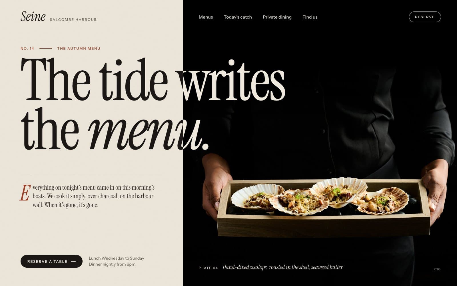 Homepage design for a harbourside seafood restaurant: an elegant serif headline, The tide writes the menu, crossing from cream paper onto a dark photo of scallops on a wooden tray